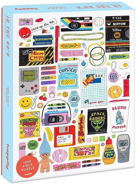 Happily Puzzles In the 90's on 1000 palan palapeli. Kuvassa 90-luvua, esimerkiksi Nokian kännykkä, Nintendo, purkkaa ja pokkarikamera. Kuvitus Holly Maguire