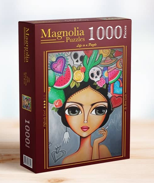Magnolia Frida palapeli on kuvittaja Romi Lerdan näkemys meksikolaisesta taidemaalari Frida Kahlosta. Meksikosta tutut elementit kuten hedelmät, kaktukset ja pääkallo näkyvät Fridan päähineessä.