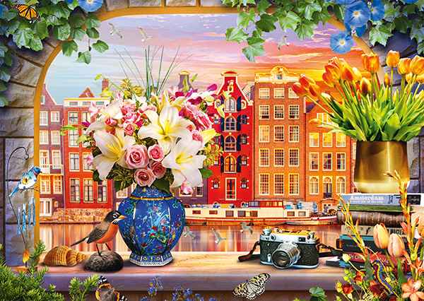 Sojourn in Amsterdam palapeli on Schmidtin 1000 palan palapeli, jonka kuvassa näkyy amsterdamilaisia taloja. Ikkunalaudalla upea kukkakimppu, jossa on liljoja ja ruusuja.